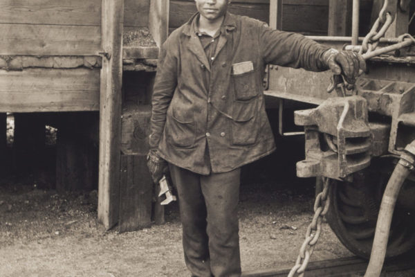 Thomas Doughton, Jr., working on the railroad, about 1916